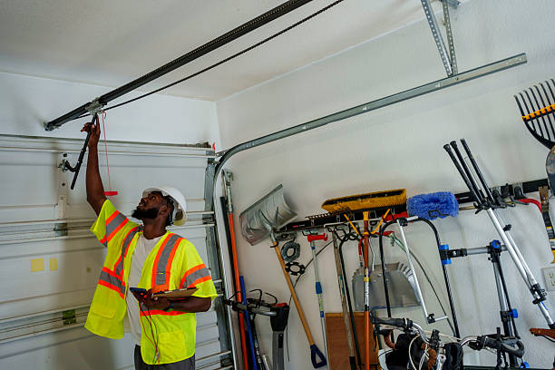 Professional Garage Door Panel Replacement technician working in Sardis, MS